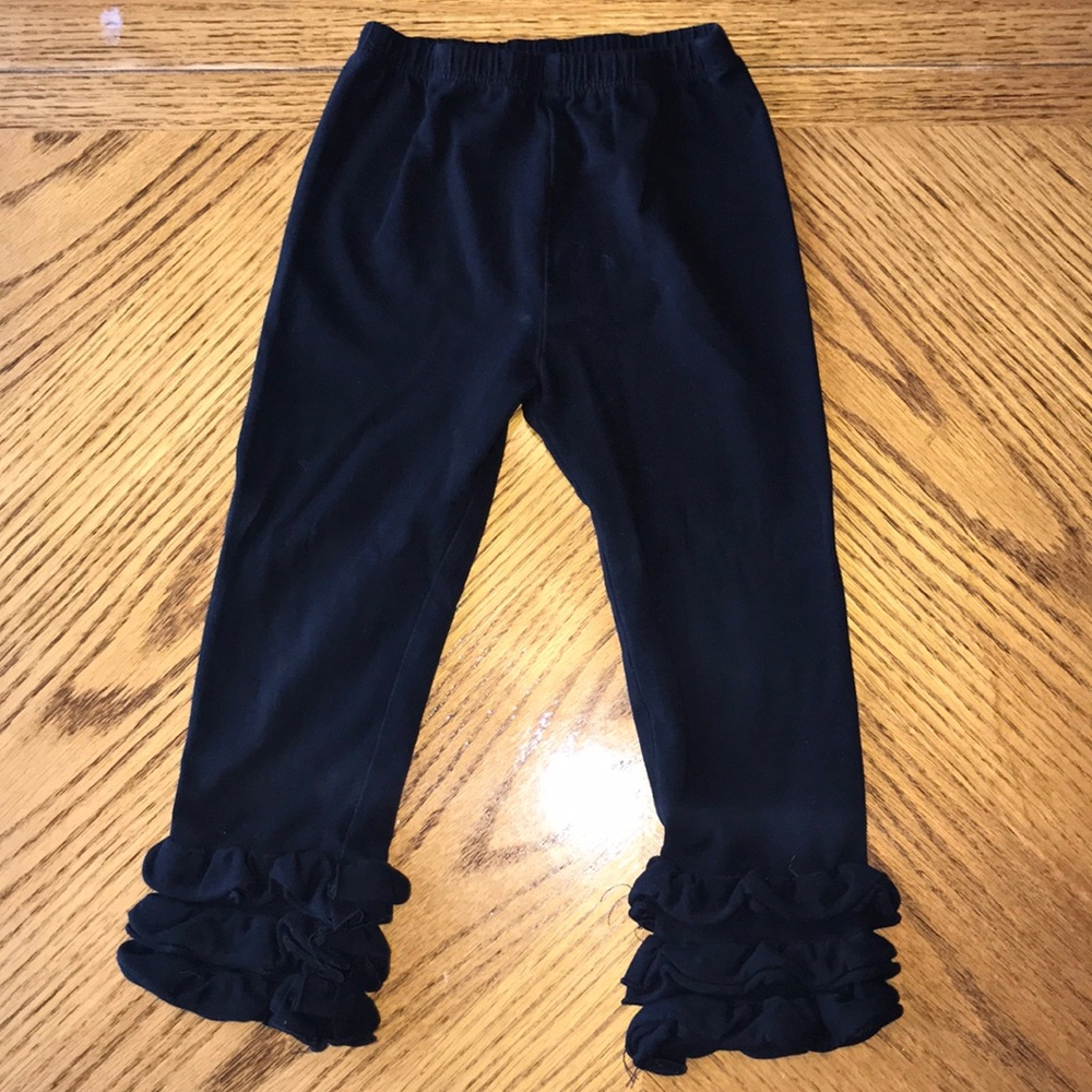 Black ruffle pants